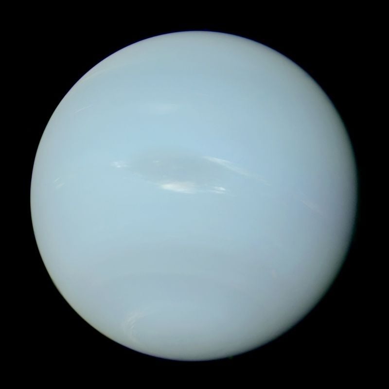 Neptune, the eighth planet in our solar system, was discovered through mathematical calculations based on observed irregularities in Uranus's orbit. Being so distant, it took the Voyager 2 mission 12 years to reach Neptune and gather valuable data. Improving telescopes and observatories have since revealed new insights about Neptune's color, weather, and moons. Contrary to popular belief, Neptune's true color is not deep blue but a pale green-blue wash. The planet's strong winds, which blow at 1,200 miles per hour, are still a mystery to scientists. Additionally, it is believed that Neptune rains diamonds due to the high pressure in its atmosphere.