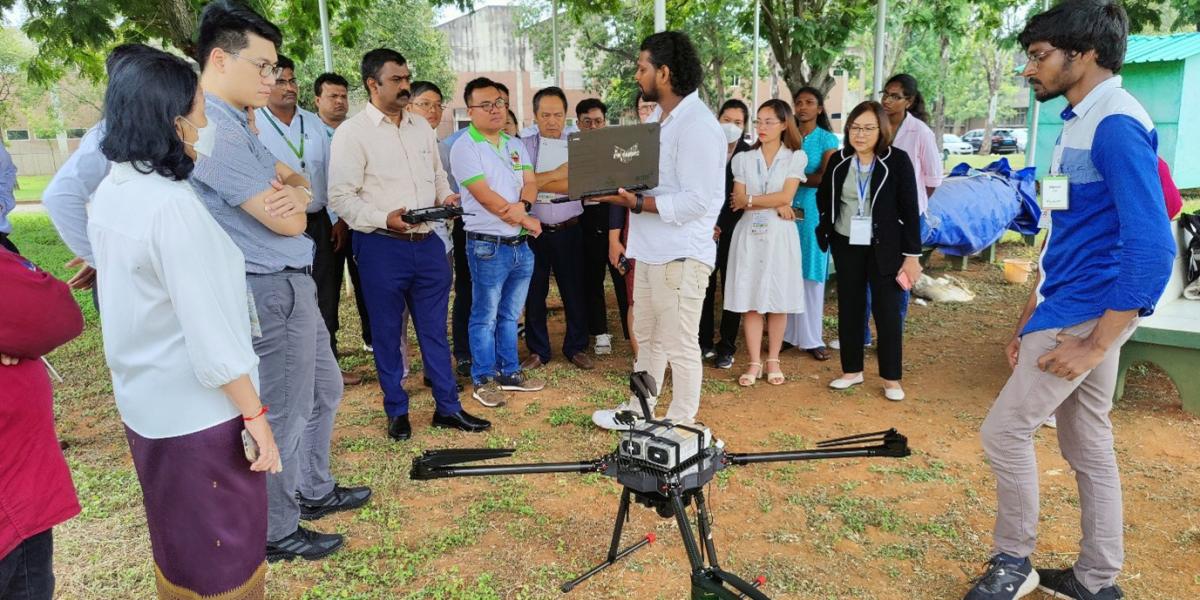 India has implemented digital innovations in agriculture since the 1990s, leading to a significant rise in food and agriculture startups, now around 3,116. The Greater Mekong Subregion's SAFSP organized a study tour to explore these technologies, highlighting autonomous vehicles, AI, and drone imaging solutions that enhance precision farming and crop monitoring. Notable innovations include the X100 robotic platform for agricultural tasks, Plantix app for pest and disease detection, Kalgudi's digital marketing platforms for produce, and FarmRobo's Minibot, designed for smallholder farmers. These technologies promote sustainability and improve market access in agri-food systems.
