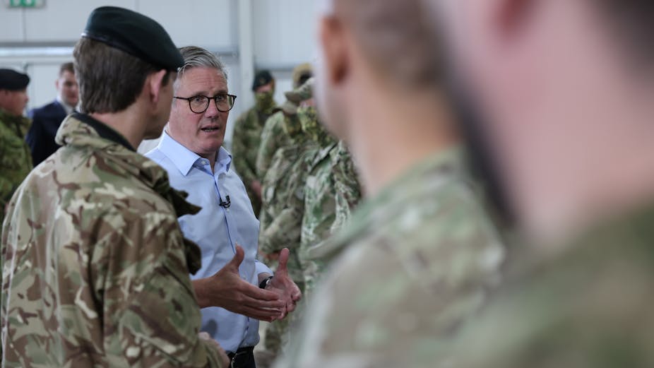 The UK faces a security crisis due to increasing threats from nations like Russia and China. The latest strategic defense review emphasizes a pivot to high-intensity warfare, focusing on remote and autonomous technologies rather than counter-insurgency. It aims to enhance the UK's military capabilities with a unified digital targeting system and stronger ties between defense and tech industries. However, the review overestimates the role of AI and autonomy in warfare, neglecting the essential human element needed for effective military operations. There is a critical need for a strategy that incorporates the importance of mass in combat, as evidenced by the Ukrainian experience.