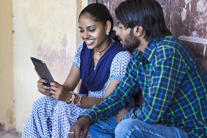 India's digital public infrastructure (DPI) supports over 1.3 billion citizens and processes more than 10 billion transactions monthly, showcasing the importance of security and privacy in its development. Key components like digital identity (Aadhaar) and payment systems (UPI) have significantly lowered transaction costs and improved access to services. However, as these systems scale, cybersecurity threats such as data breaches, synthetic identity fraud, and algorithmic bias emerge as critical challenges. India's model emphasizes integrating security from the outset, combining government oversight with private sector innovation, creating a resilient public good approach to infrastructure.