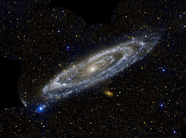Dr. Edwin Powell Hubble made a groundbreaking discovery 100 years ago when he found that two spiral-shaped nebulae, previously thought to be within the Milky Way, were actually located outside of it, making them the Andromeda and Messier 33 galaxies. This discovery confirmed the existence of galaxies beyond our own and paved the way for the estimation that there are several trillion galaxies in the universe. Hubble's discovery was made possible by the work of Henrietta Swan Leavitt, who established the period-luminosity relationship, which allowed astronomers to calculate distances to stars. Hubble's use of the stellar parallax method and the use of large telescopes further supported his findings.