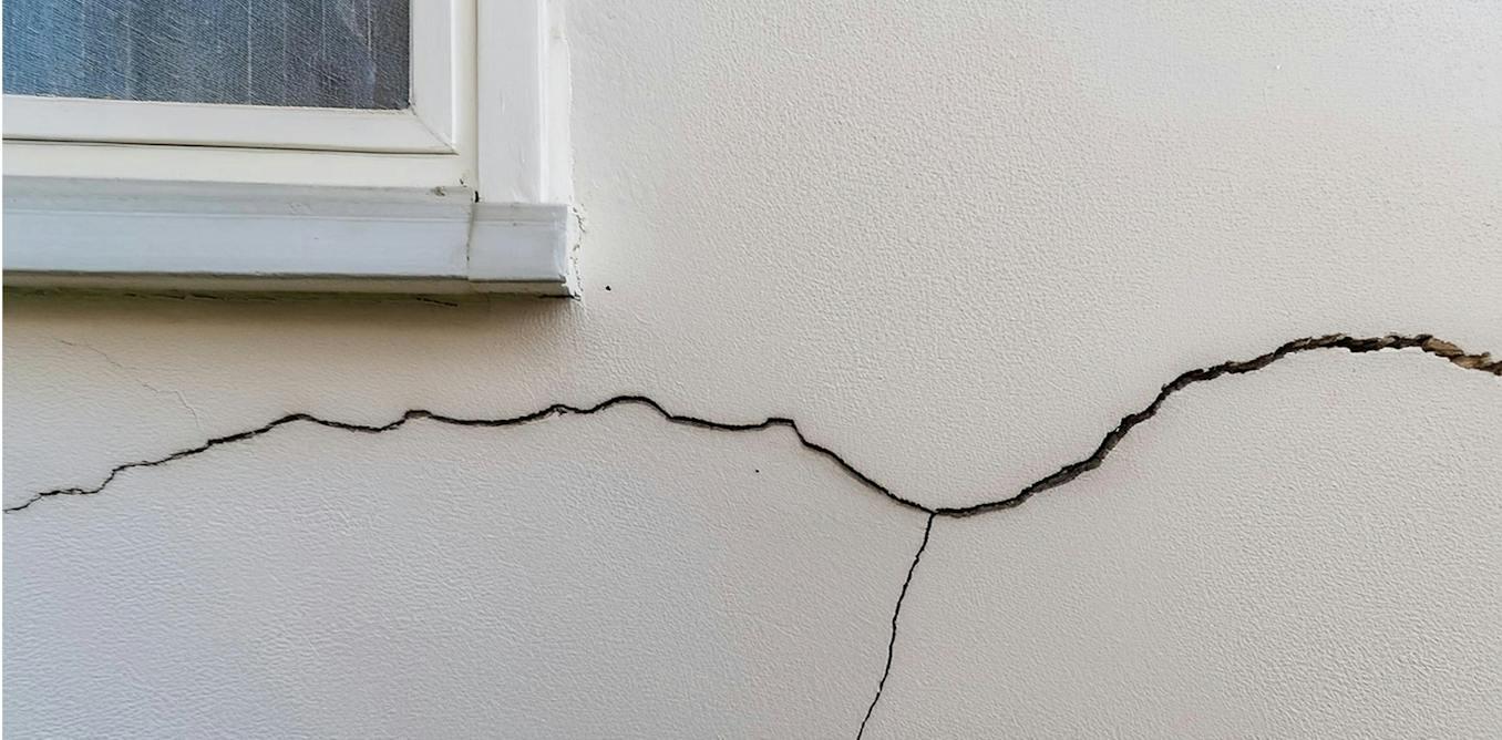 Drought causes clay-rich soils to lose moisture and contract, leading to uneven ground shrinkage that can damage house foundations and cause cracks. When rain returns, soils may swell unevenly or collapse suddenly due to weakened soil structures and displaced particles, exacerbated by factors like leaking drains or soakaways. Soil behavior varies locally, influenced by foundation depth, vegetation, and drainage conditions. Soil degradation from drought also impacts erosion, microbial activity, and crop yields. Homeowners should monitor cracks and structural changes, ensuring proper drainage and consulting professionals if damage progresses.