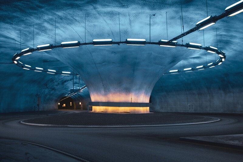 The future of infrastructure by 2100 will hinge on balancing resilience, equity, and control amid climate challenges. Existing fossil fuel-based infrastructures are inadequate for climate extremes, and a decarbonization gap persists. Key issues include delayed adaptation, societal demands for transformative services, a widening investment gap, and shortages of strategic materials. Five possible scenarios envision a shift toward sustainable practices through renovation, regional collaboration for energy and resource distribution, and AI-driven urban planning. However, failure to adapt may lead to systemic financial losses and increased reliance on fossil fuels.