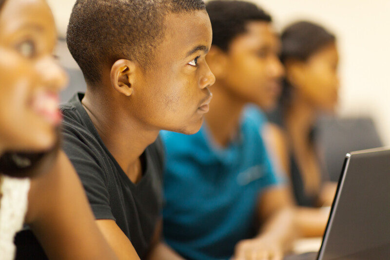 Volunteers are enhancing youth-led education through initiatives like Voices Unbound, which provides English language education to orphaned children in Jeddah and has expanded to Zanzibar. These programs focus on community trust and mentorship, fostering not just language proficiency but also confidence and critical thinking. Participants experience personal growth and aspiration through activities like public speaking and role-playing. Success in Zanzibar illustrates the model's broad applicability, suggesting that such youth-led, resource-efficient programs can significantly improve educational outcomes and empower local communities worldwide.