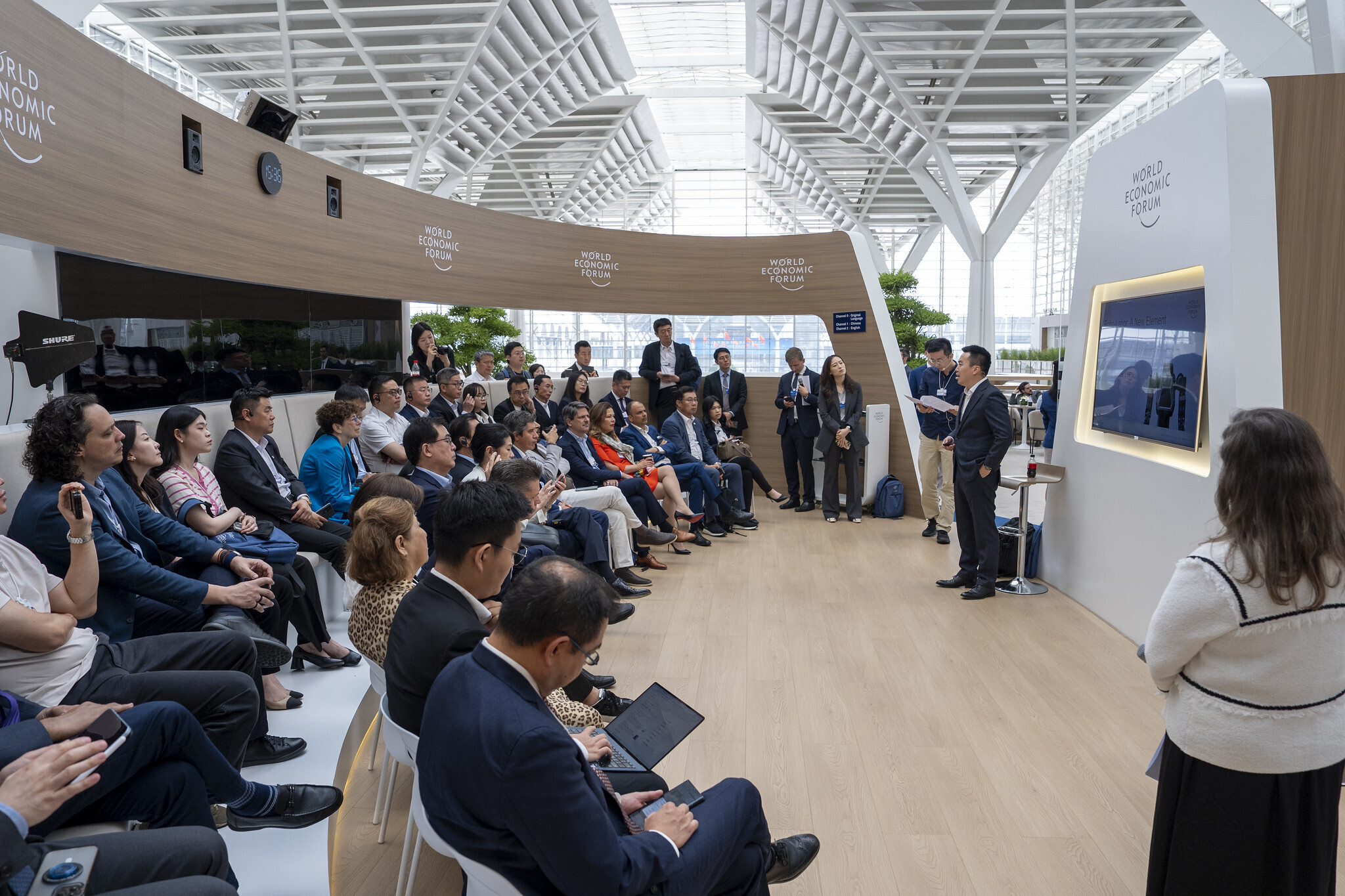 The final day of the World Economic Forum's Annual Meeting of the New Champions (AMNC 2025) in Tianjin focuses on China's economic outlook and AI strategy, alongside discussions on geopolitics, entrepreneurship, and innovation. Keynote speakers emphasize the significance of the right policy environment for fostering entrepreneurship. Discussions highlight the intricate connections between the U.S. and China, with both economies remaining deeply intertwined despite tensions. Insights on advanced R&D and integrated supply chains illustrate China's potential in driving innovation through AI, which is expected to impact multiple industries significantly.