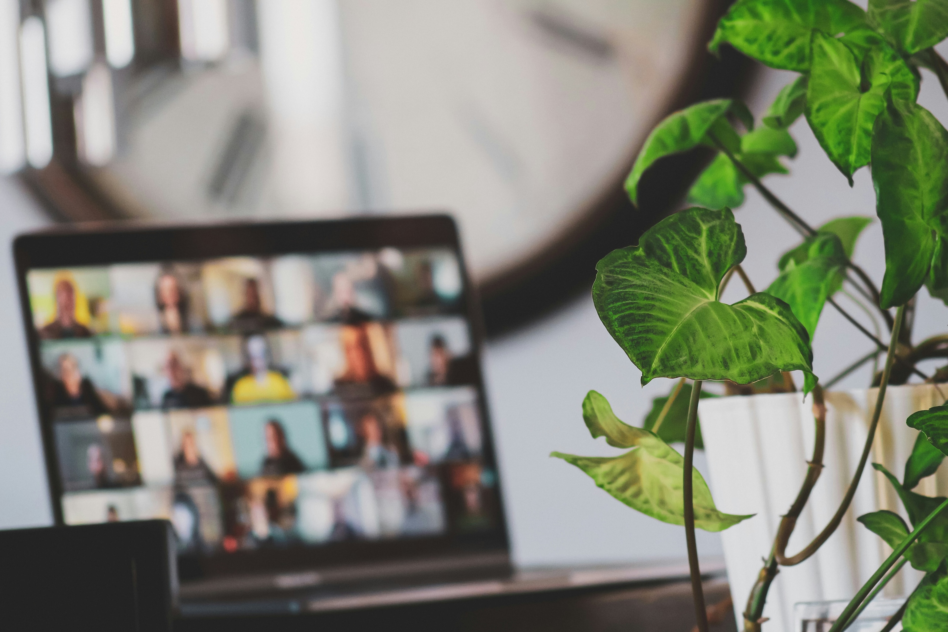 Remote work has a carbon footprint linked to digital infrastructure like video conferencing and cloud storage, which can negate the benefits of reduced commuting. An hour-long HD video call can emit significant CO2, and constant use of digital services drives energy demand in data centers. To mitigate emissions, organizations can adopt measures such as lowering video resolution, shifting to asynchronous workflows, evaluating cloud sustainability, and integrating carbon tracking. Technology can further enhance sustainability through AI optimization and green software engineering. Companies need to include digital collaboration emissions in their environmental, social, and governance (ESG) frameworks.