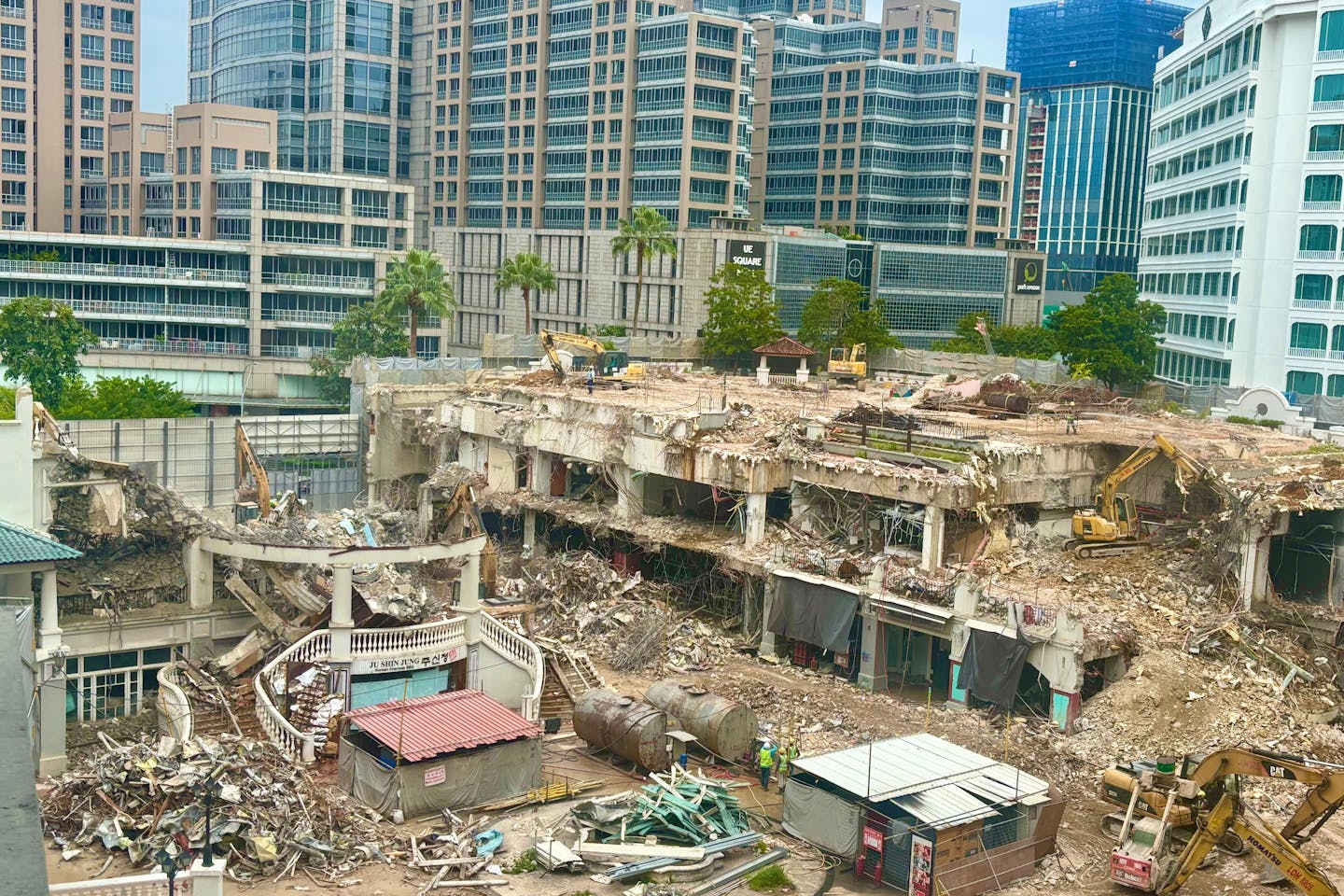 Retrofitting and reusing existing buildings in Singapore can reduce embodied carbon emissions by nearly 70%, significantly lowering the construction sector's climate impact. A study by the Singapore University of Technology and Design found that retaining structural elements cut emissions from concrete by 91.8% and metals by 63.9%. Despite these benefits, demolition and rebuild remain the norm, driven by under-regulation and underestimation of embodied carbon in carbon accounting tools. The study recommends setting embodied carbon thresholds, updating Green Mark certification to reward reuse, and creating green financing incentives. These changes could help Singapore meet its goal to green 80% of buildings by 2030 while reducing material waste and emissions.