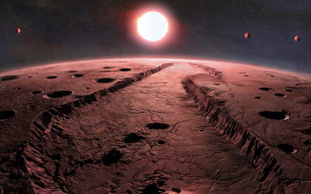Barnard’s Star, a dim red dwarf located just six light years from Earth, now has four small planets detected in its orbit. These planets were identified through their gravitational effects on the star, using advanced spectrograph instruments over several years. The confirmed planets have short orbital periods ranging from two to seven Earth days and are likely rocky with surfaces exposed to high radiation, making them too hot for liquid water. The discovery provides insights into planetary formation and suggests that many more planets may exist around red dwarfs, the most common type of star in our galaxy.