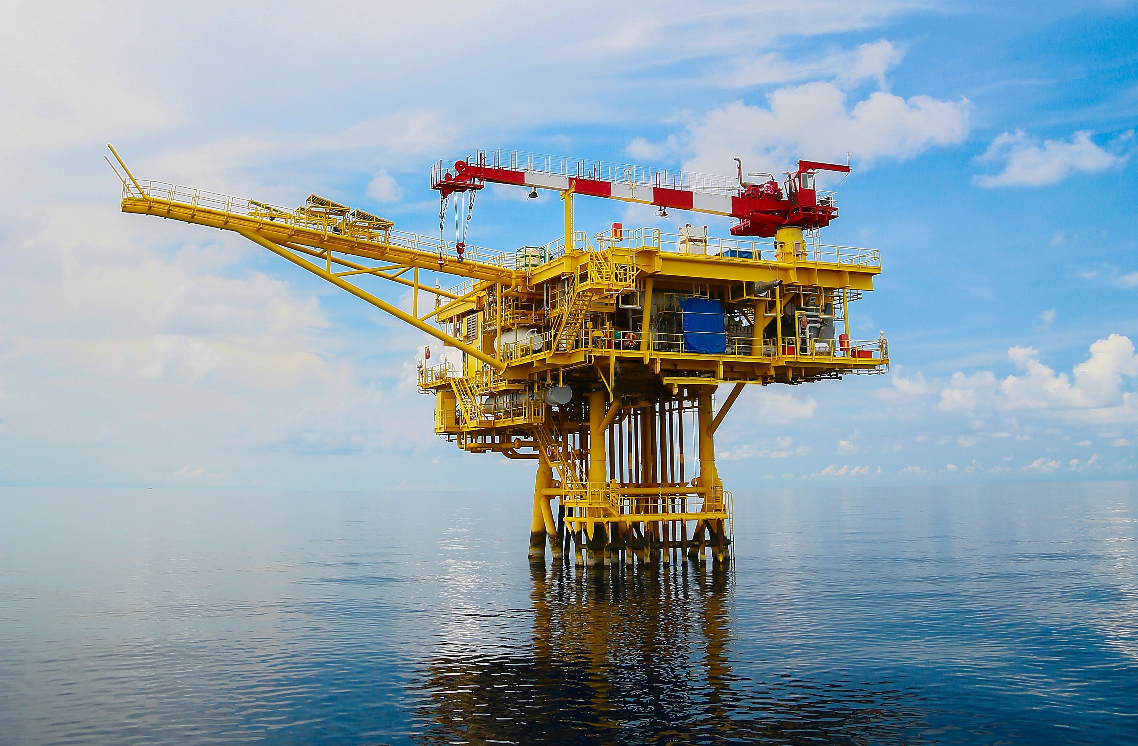 Artificial intelligence (AI) has the potential to enhance traditional ocean industries and support a sustainable blue economy. The global economy heavily relies on ocean assets, such as offshore energy platforms and shipping fleets, which often contribute to environmental degradation. By utilizing AI, industries can reimagine their existing infrastructure, turning aging oil and gas platforms into renewable energy sites and optimizing shipping routes for efficiency and lower emissions. AI can also improve port operations, reducing congestion and enhancing trade. This transformation aims to create a circular blue economy, balancing economic growth with ecological stewardship.