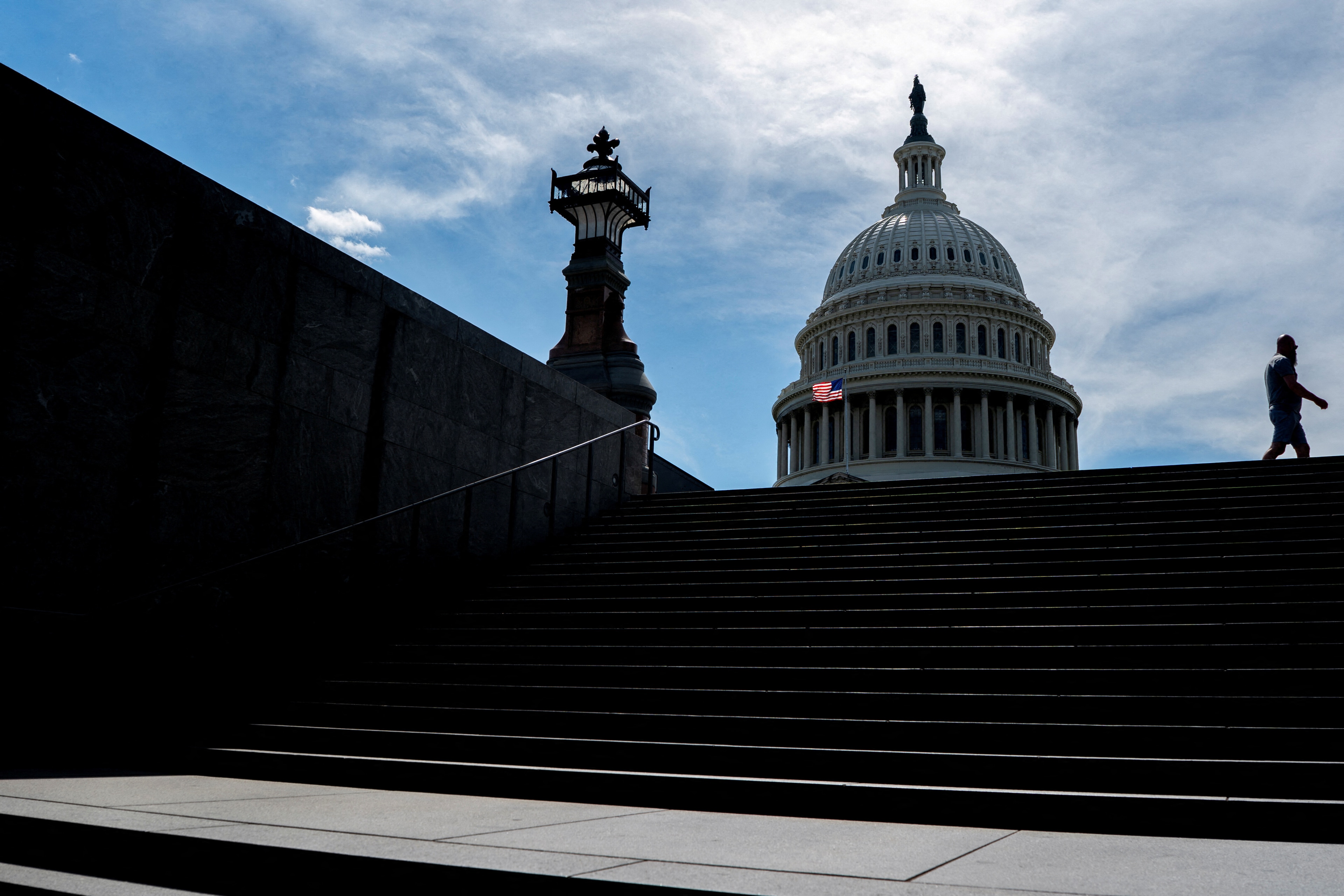 Rising fiscal pressures globally are leading to increased concerns over public debt levels, with the US projected to face deficits reaching 6.9% of GDP and a debt burden of 125% by 2034 due to a proposed tax bill. The IMF predicts that global public debt will exceed 100% of GDP by the decade's end, heavily impacting developing nations facing declining aid and burgeoning debts. Bond markets are reacting, with yields increasing as risk perceptions rise, particularly in countries like Japan. Despite challenges, nations are adapting by enhancing regional ties and economic integration initiatives. Global GDP growth is expected to weaken to 2.3% this year, reflecting these economic shifts.