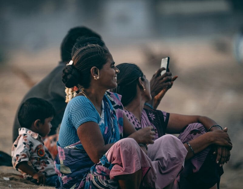 India's inclusive AI journey exemplifies the benefits of open digital innovation, showcasing how accessibility and co-creation can drive transformative technologies. The country’s successful digital public infrastructure, including Aadhaar and the Unified Payments Interface, has expanded financial inclusion from 53% to 80% within a decade. This model advocates for openness as a strategic imperative, allowing diverse stakeholders to innovate collaboratively and effectively. India’s diverse demographics offer a unique testing ground for AI systems, enabling solutions like Bhashini to enhance language accessibility. The upcoming 2026 Global AI Summit presents an opportunity to align these lessons with global initiatives for a more inclusive AI ecosystem.
