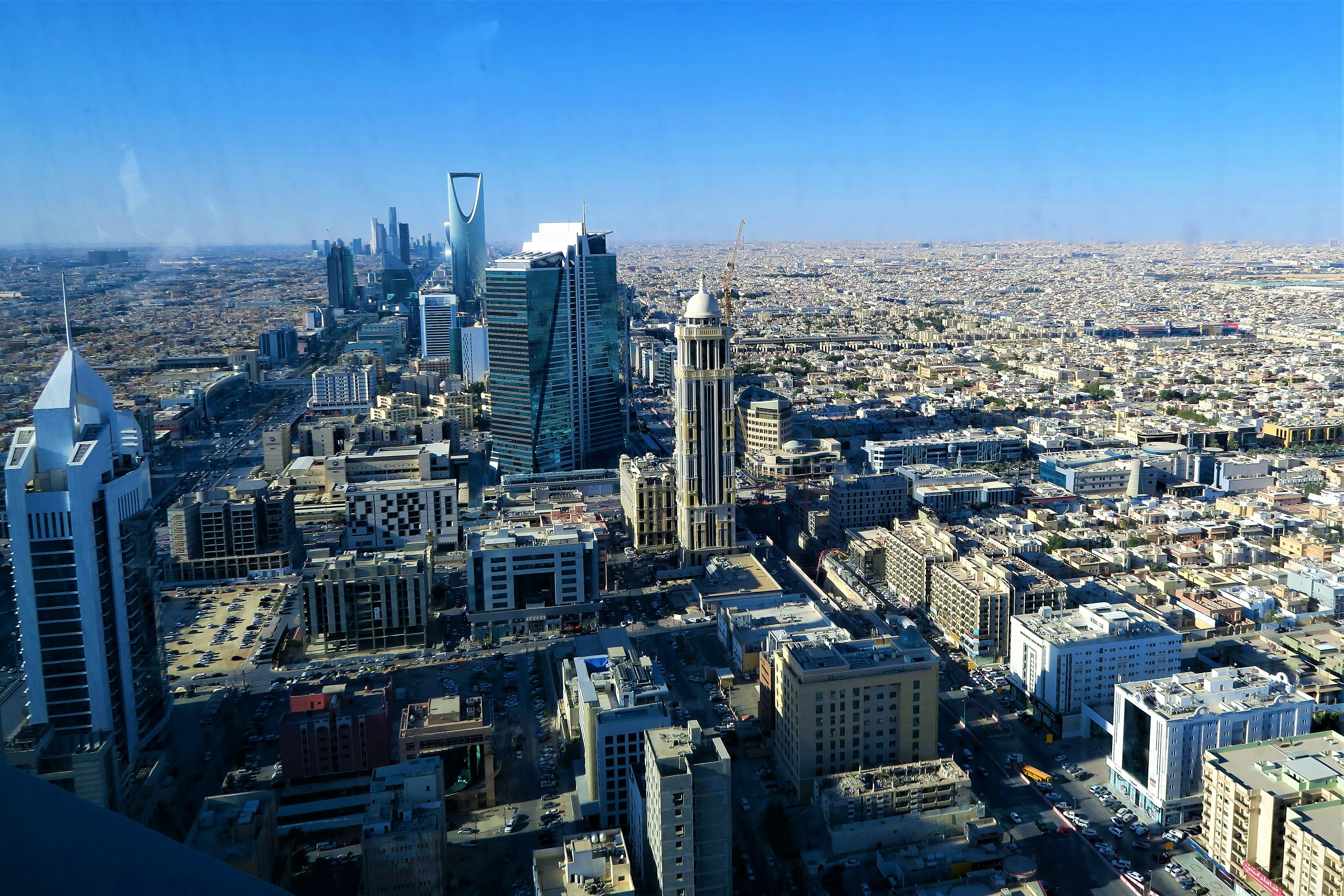 Saudi Arabia is undergoing a significant transformation focused on economic diversification, diplomatic mediation, and energy transition. With Vision 2030, non-oil sectors now account for 52% of GDP, and growth is projected at 6.2% by 2026. The Kingdom is positioning itself as a global diplomatic broker, illustrated by hosting US-Russian talks on Ukraine, while investing heavily in the US. Additionally, Saudi Arabia aims to become a key player in climate finance, leveraging its Public Investment Fund to address global climate challenges. However, it faces challenges related to youth employment, regional competition, and the balancing act of managing fossil fuel assets against clean energy goals.