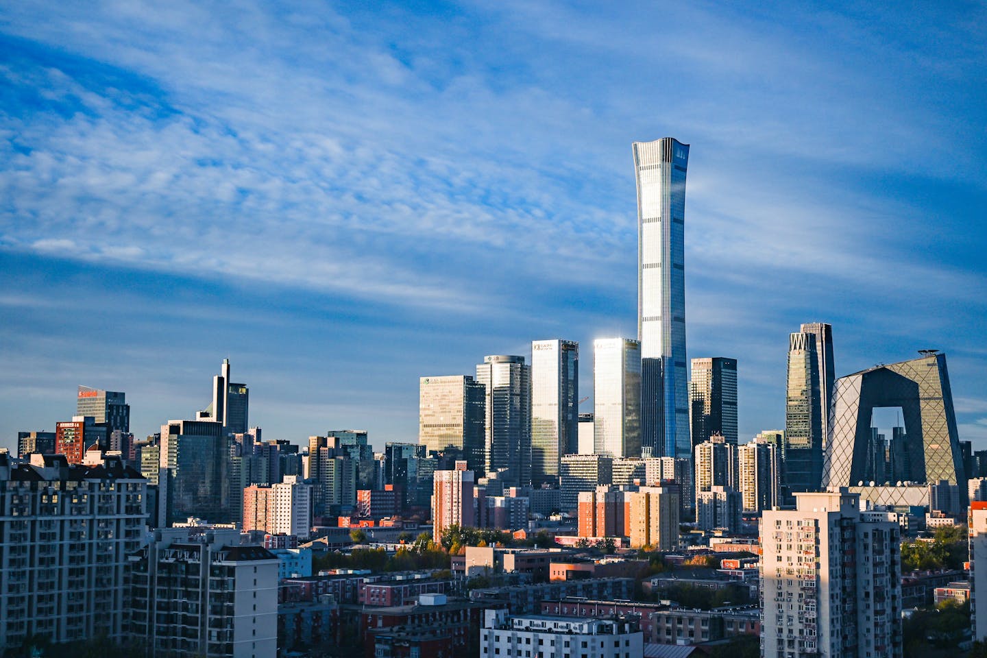 China's overseas clean energy investments have surged to over $180 billion since early 2023, marking an 80% increase within a year. This growth is reshaping global power dynamics as developing nations seek energy security and alternatives to U.S. influence. Countries worldwide are implementing green industrial policies to attract Chinese capital, resulting in joint ventures and significant infrastructure projects across various regions. While these partnerships promise cheaper power and technology upgrades, there are concerns over dependence on China and the need to balance foreign investment with local industry protection.